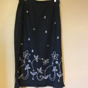 Black maxi skirt. With white thread embroidery.